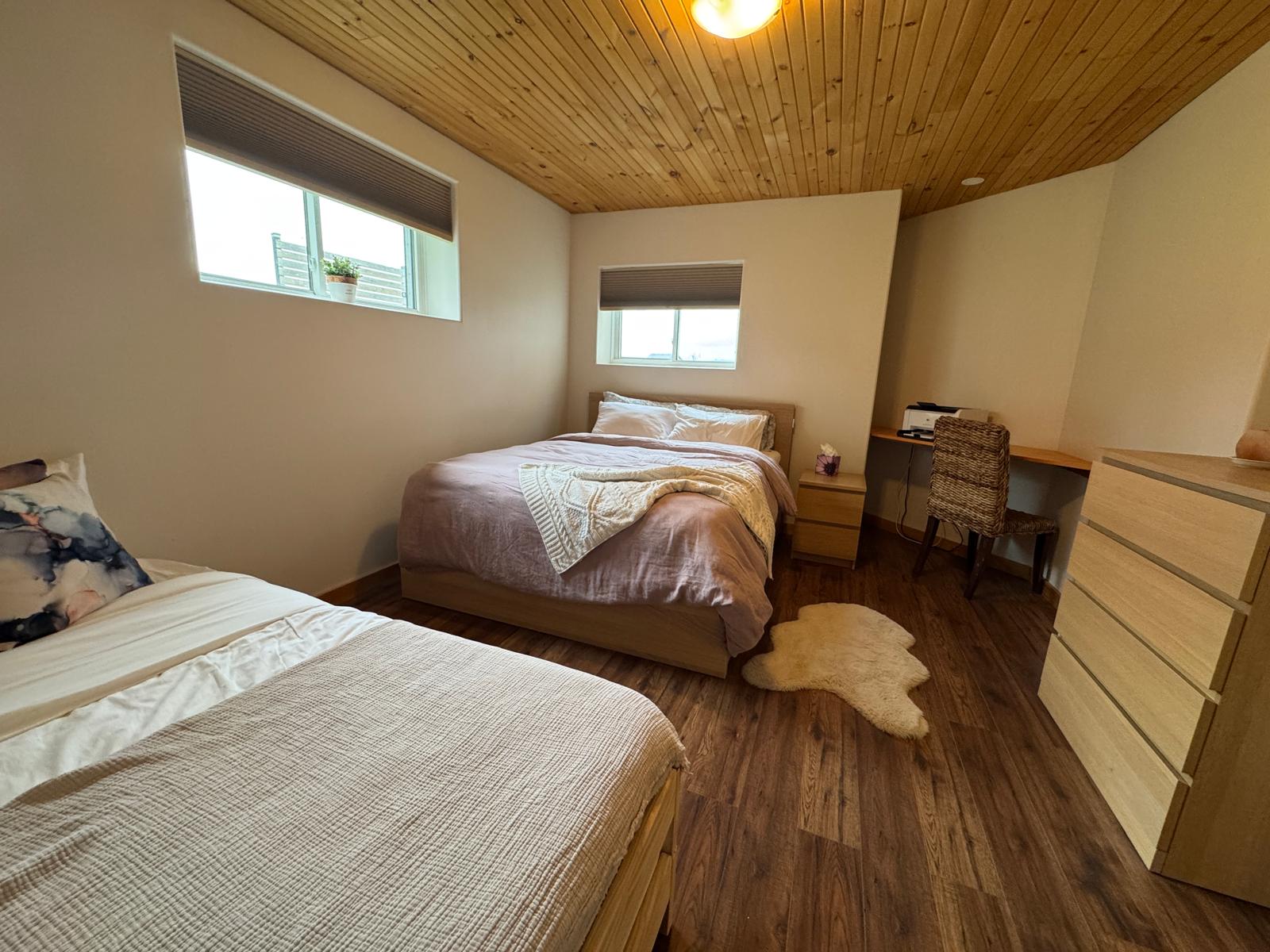 Basement suite bedroom second view