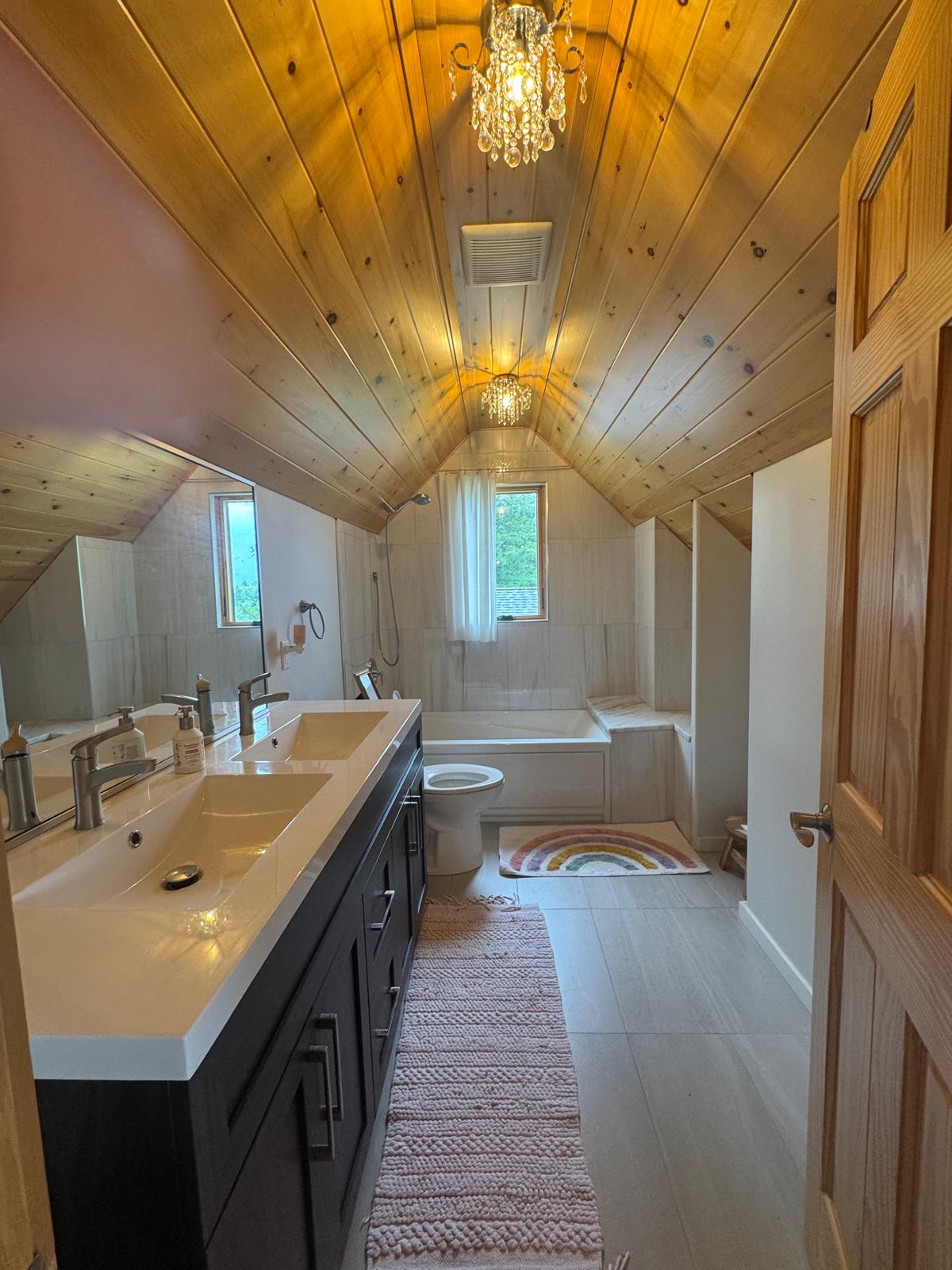 Loft bathroom with bathtub